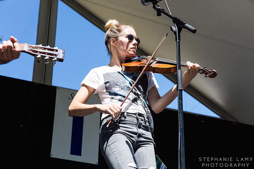 Canadian singer songwriter Dustin Bentall and Canadian singer/musician and fiddler Kendel Carson on stage 1 during Day 2 of the Vancouver Folk Music Festival at Jericho beach park on Saturday Jul 14, 2018, in Vancouver, BC, Canada - Photo © Stephanie Lamy